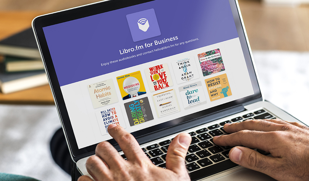 Person on laptop using Libro.fm for Business